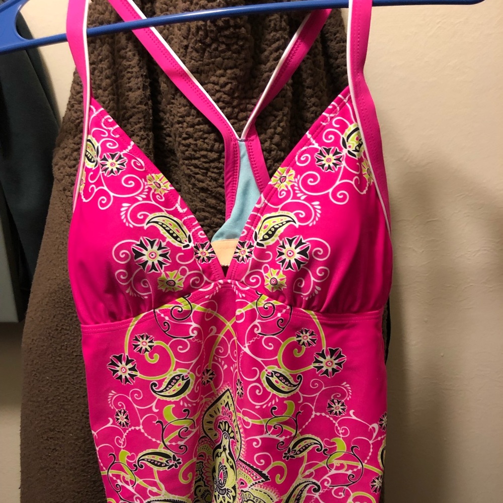 Athletes swim top